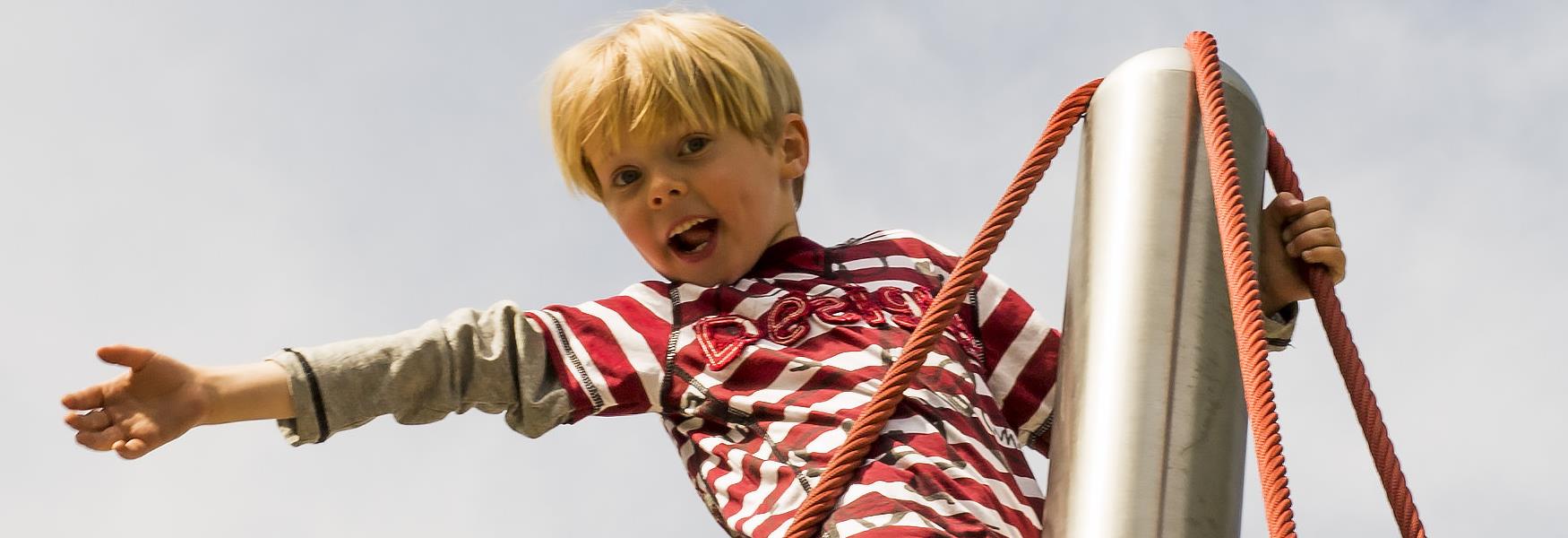 Boy on a climbing frame