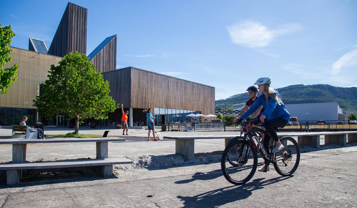 cycling past the Book & Blues House in Notodden