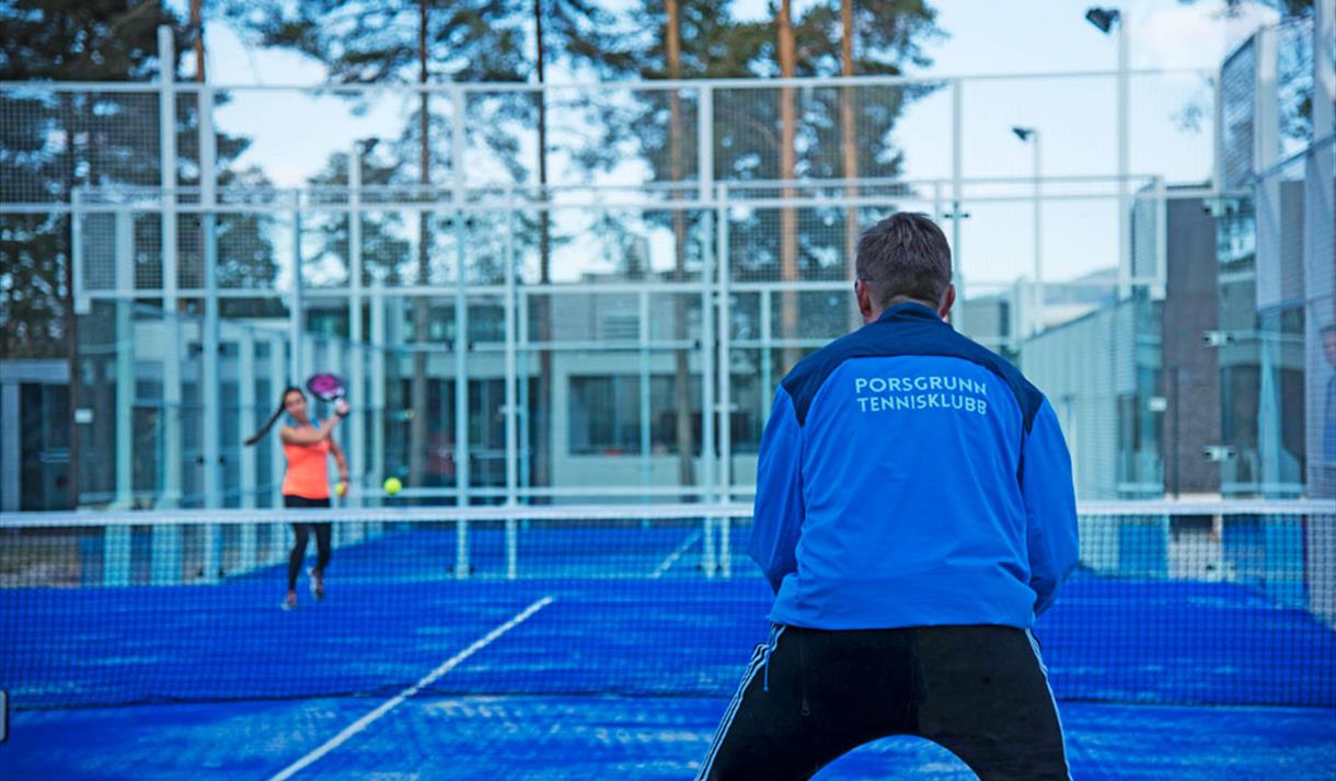 man and woman play padel tennis in Skien leisure park