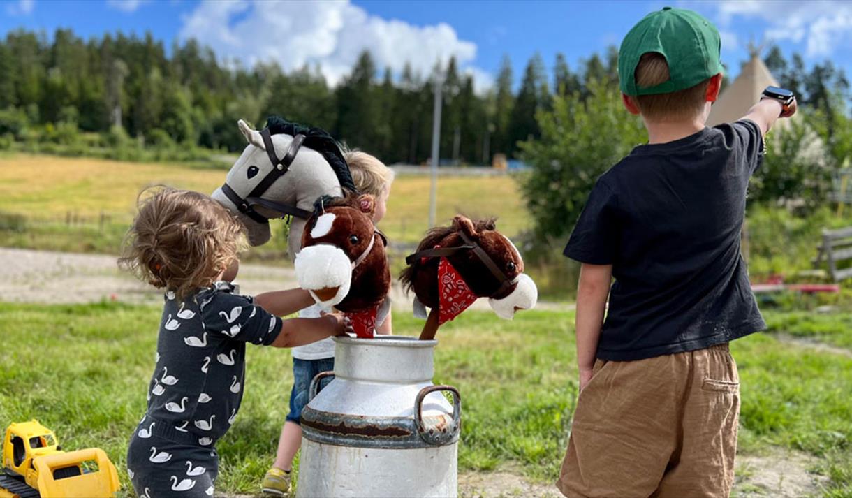 children with hobby horses at Brekka Farm in Skien