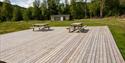 Terrace with picnic table at Morgedal Camping