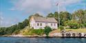 Langøya Hovedgård restaurant and cultural site seen from the water
