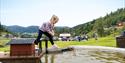 girl playing in the water park at the Norwegioan Skiing museum