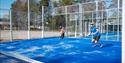 man and woman play padel tennis in Skien leisure park