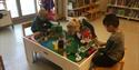 Children play in the library