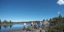 Cycling at Gautefall - five on a trip with a break by calm water