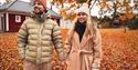 couple in Brekke Park in the fall