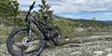 cycling over boulders on Gautefallheia in Drangeda. - bicycle in the mountains