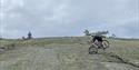 cycling over boulders on Gautefallheia in Drangedal